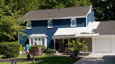 New house exterior being painted