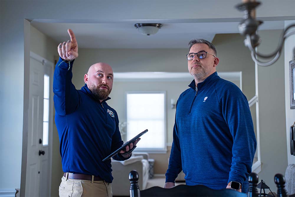 Groovy Hues Painting of Philadelphia color consultant discussing paint colors and project details with a homeowner during an in-home color consultation in Newtown, PA.